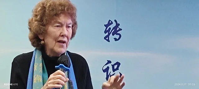 Professor Tucker of Yale University giving a speech.