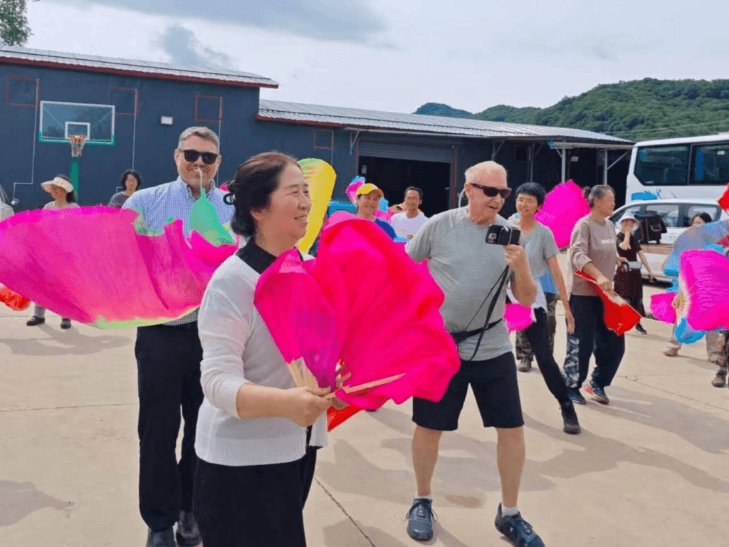 Wm. Andrew Schwartz, Yang Li, and Kevin Clark in Wuchang